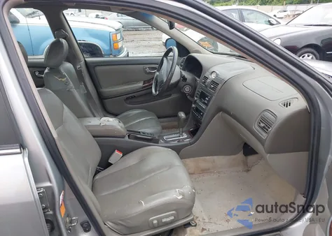 2001 Infiniti I30 Luxury из США, поврежденный, VIN JNKCA31A91T035878